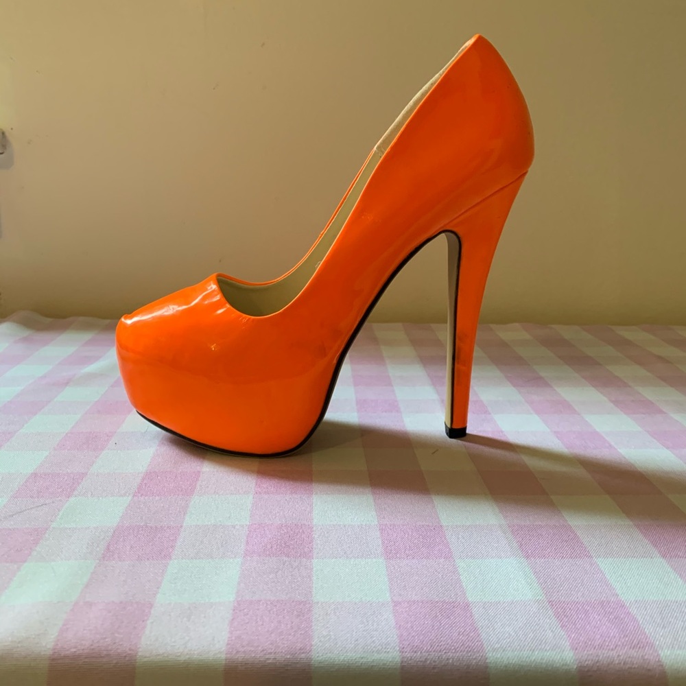 Neon orange stilettos